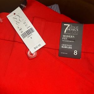 New red capri pants with New York company label 
 New red capri pants with tag